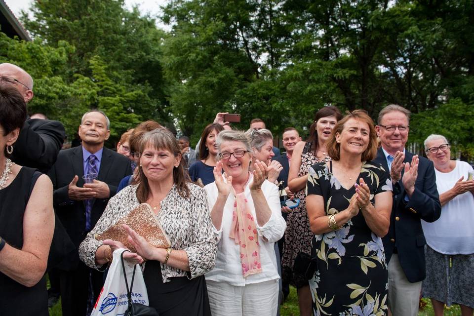Crowd cheering at wedding