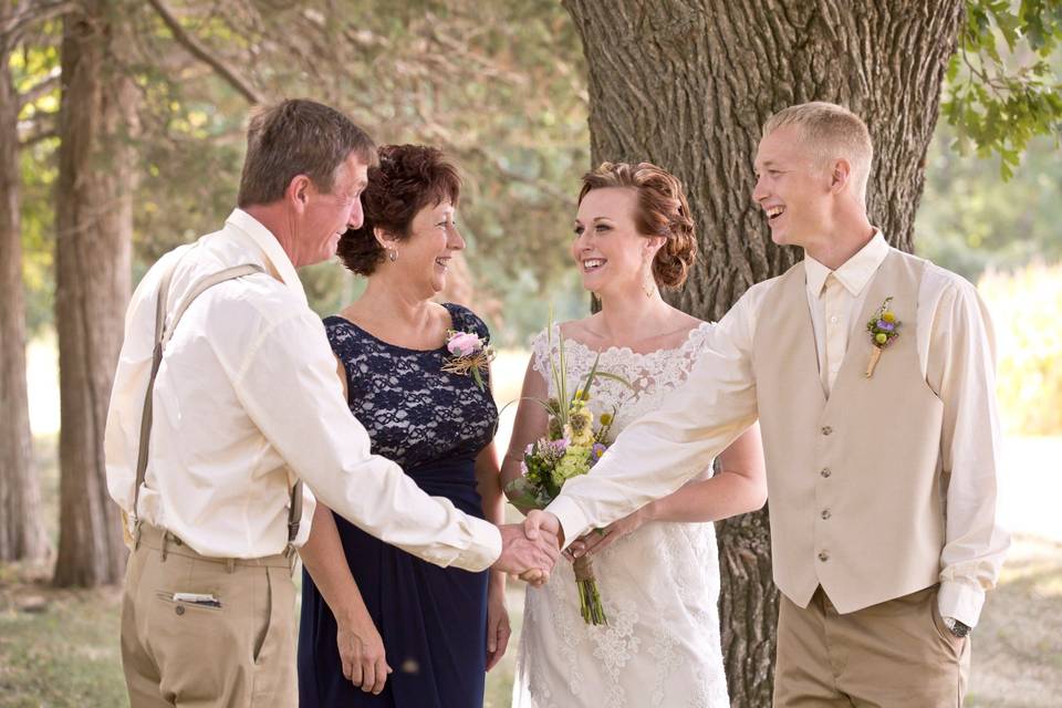 Groom, bride and her parents