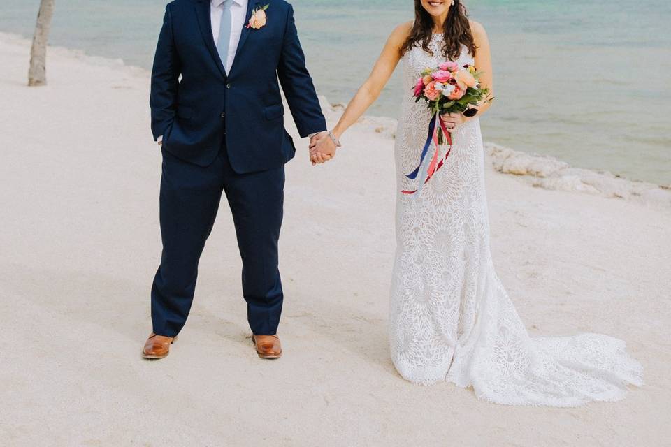 Newlyweds by the beach