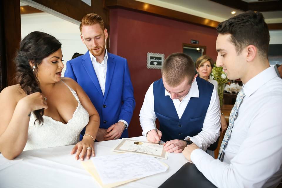 Signing the marriage license