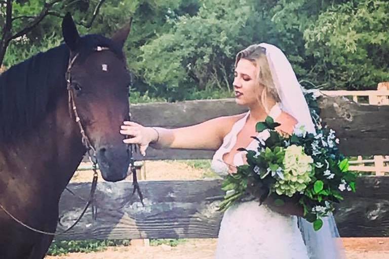 Such a beautiful bride with horse
