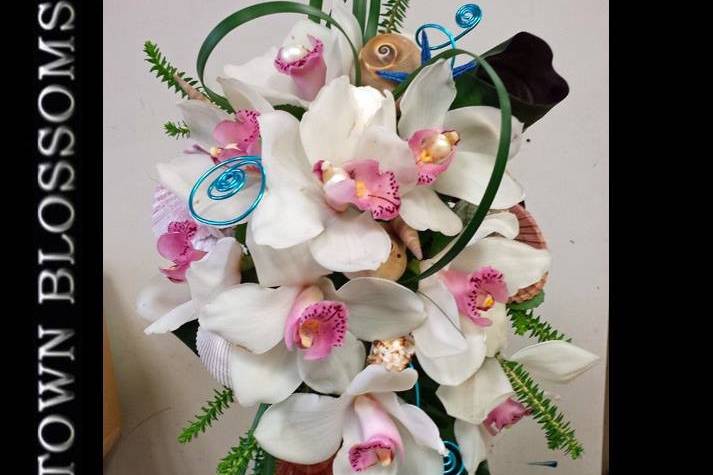 Cascade style bouquet of Cymbidium Orchids.