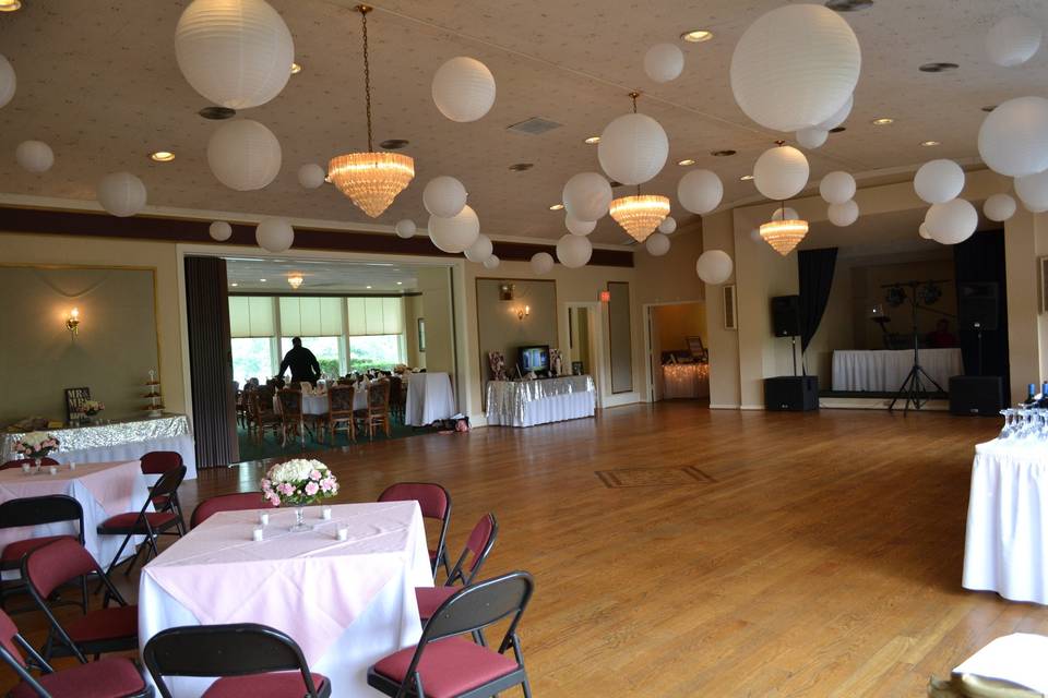 The dance floor of this fun, yet classic, Beauty and the Beast themed wedding reception.