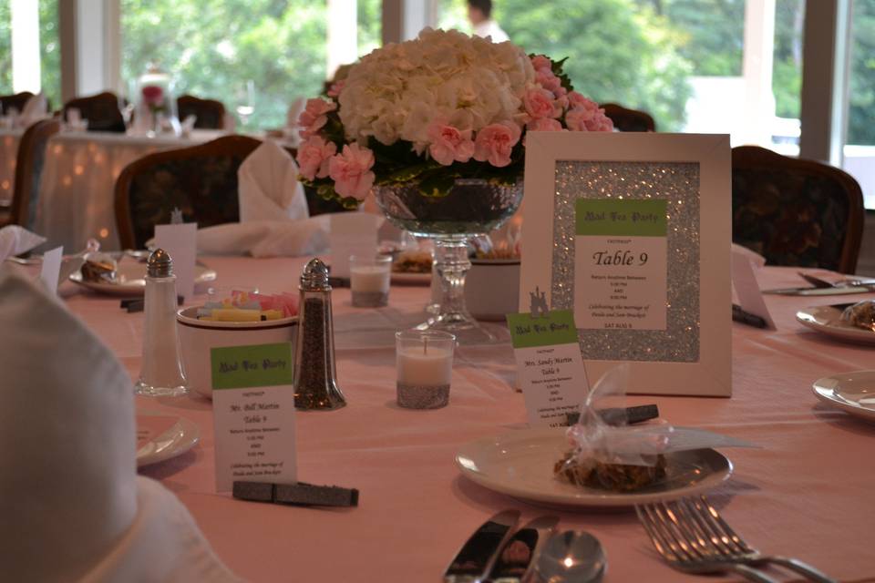 Cassandra Poling Events created the custom table numbers and escort cards for this classic wedding reception