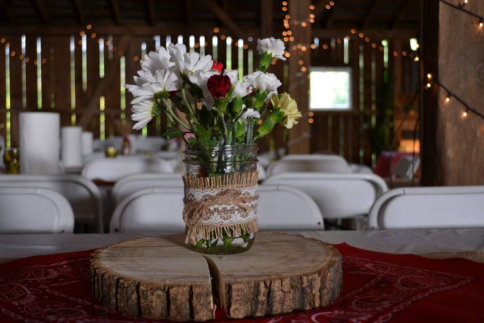 These simple and rustic centerpieces were a perfect and economical fit for this barn event!