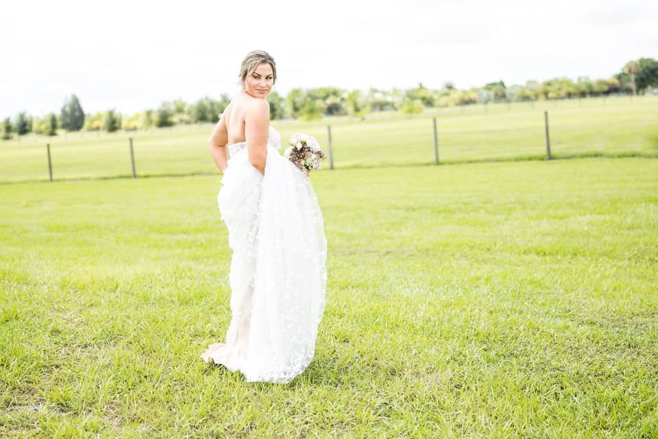 Bride in gown at ranch