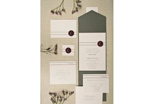 Your wording is flat printed in charcoal while your names and initial design are printed in eggplant on luxurious bright white paper. Personalized tabs and charcoal pockets are included. (TD113EP)