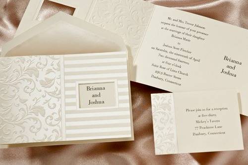 This lovely invitation has pearl stripes and an intricate pattern. Your names peak through a window on the front. (T1402)