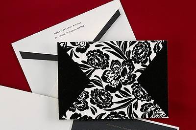 Velvet Petals Invitation: This invitation features a black shimmer card with a ecru and black velvet floral wrap.