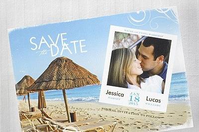 On the Beach Save the Date Card- The beach, ocean, beach chairs and a tiki hut are shown on this destination save the date card.