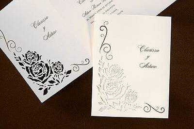 2014 Wedding Trend - Laser Cut: A laser cut flower wrap is included with this ecru colored invitation.
Dimensions: 5