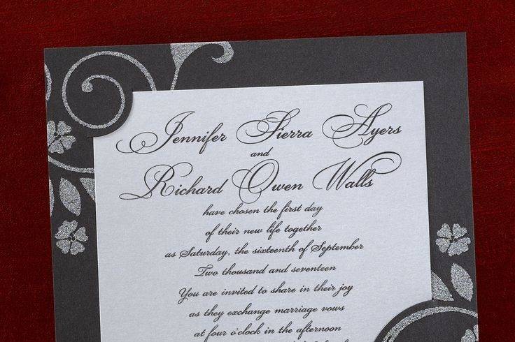 A silver shimmer invitation is held in a black shimmer and silver sparkle dust swirl backer card. Dimensions: 7