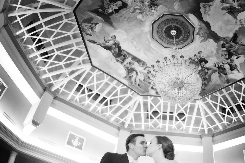 Groom and bride kissing