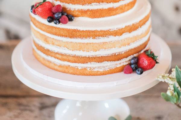 White wedding cake with berries