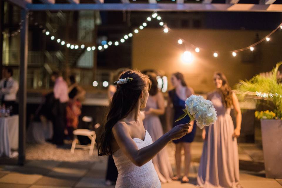 Bride tossing the bouquet