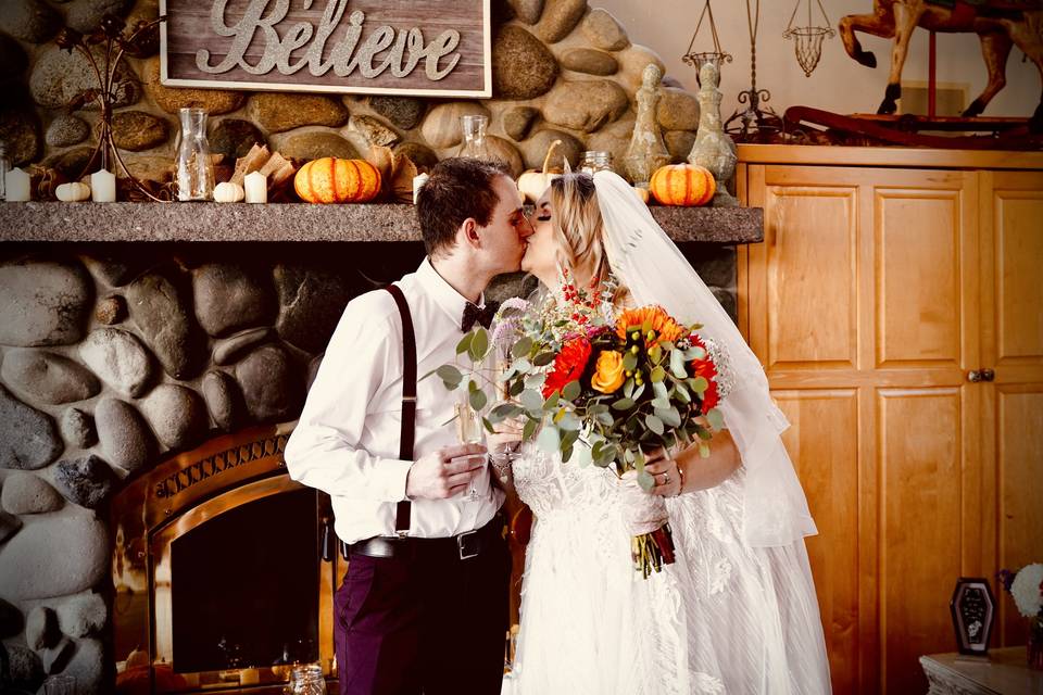 Kiss by the fireplace