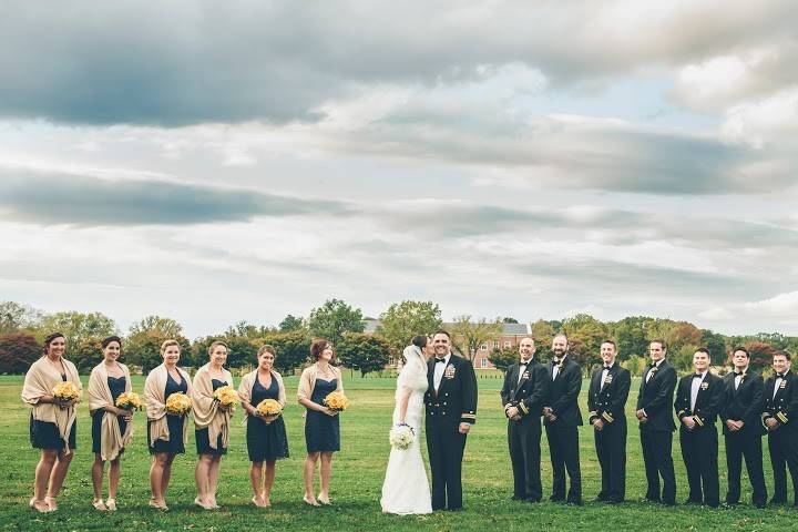 The couple with the bridesmaids and groomsmen