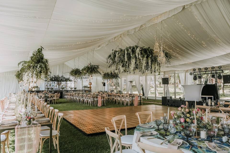 Tented dance floor with drapes