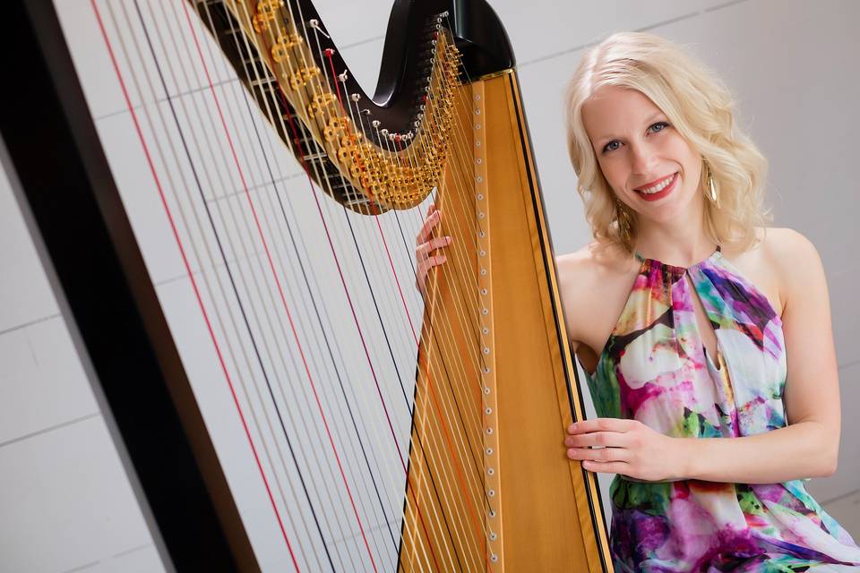 Harpist in a colorful dress