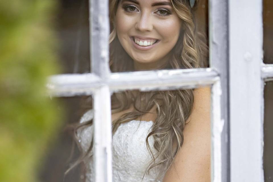 Bride through a window