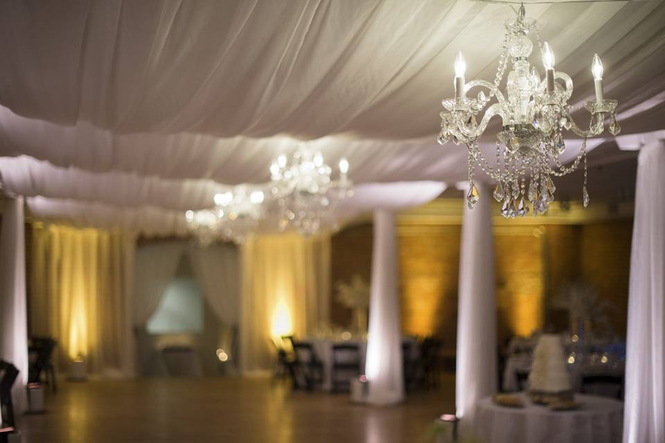 Fabric Draping, Crystal Chandeliers & Amber Uplighting Transform the Boulder Museum of Contemporary Art's Event Space