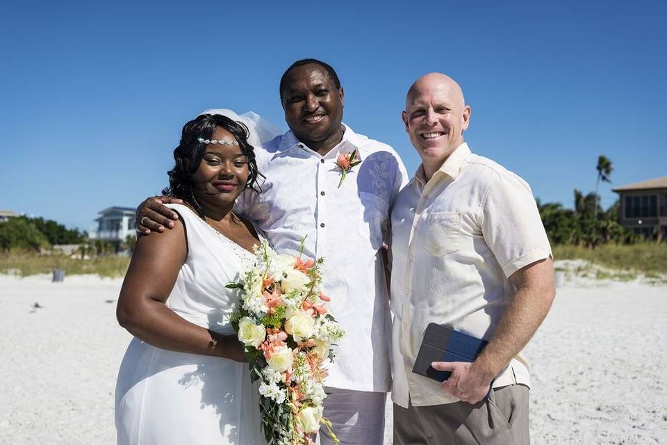 Newlyweds and the officiant