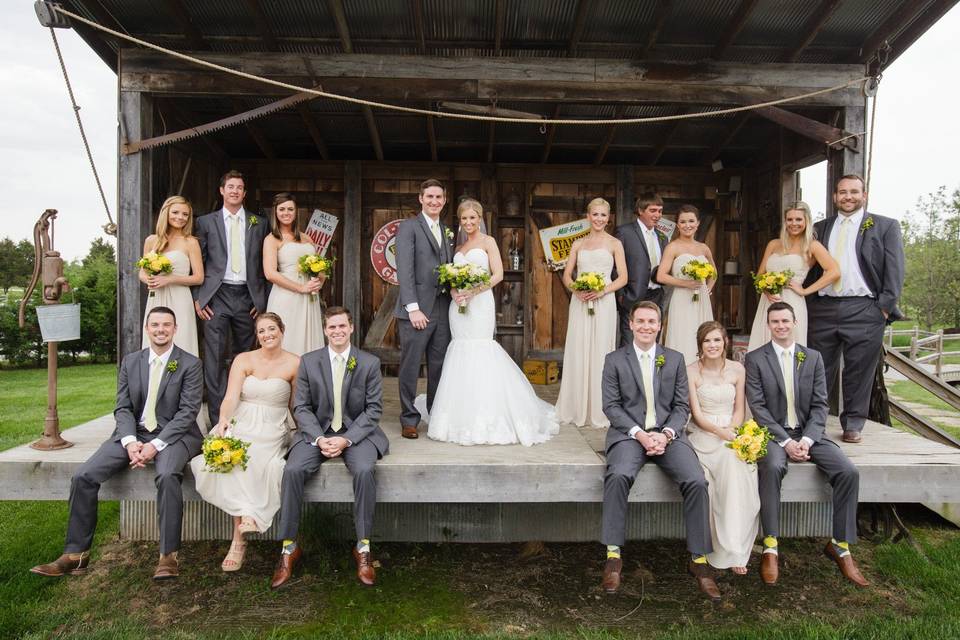 The couple with the bridesmaids and groomsmen