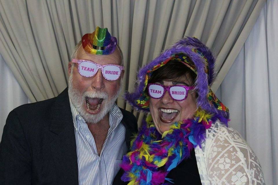 Couple wearing silly hats and shades