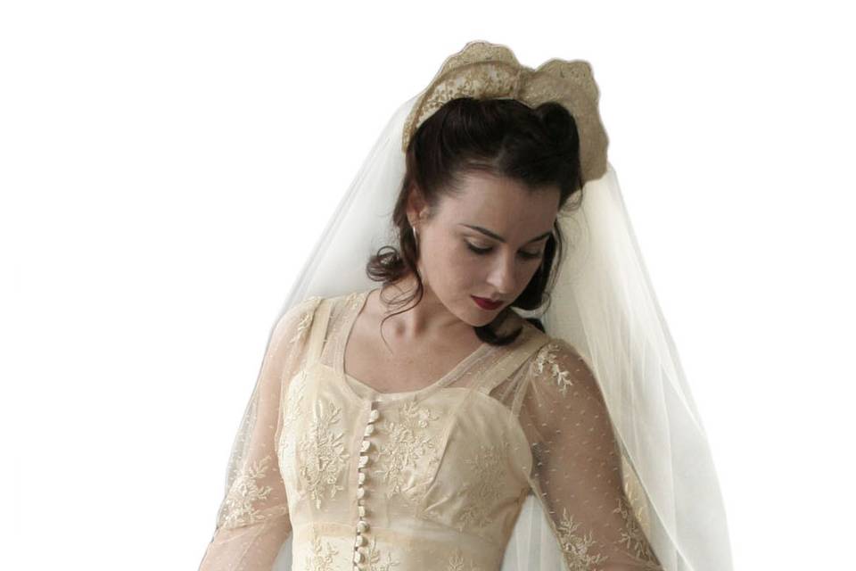 The Lillian is part of our ready-to-wear bridal collection. This Ivory lace gown is a stunning and accurate example of bridal wear from the early 1940s.
All of our silhouettes can be made in the fabric of your choice.