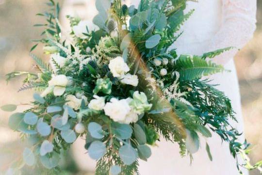 Bride looking at her flowers on her Wedding Day presented by New York Wedding Videography by Belinda Video Productions