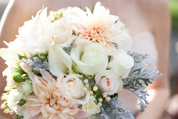 Bride enjoying her flowers on her Wedding Day presented by New York Wedding Videography by Belinda Video Productions