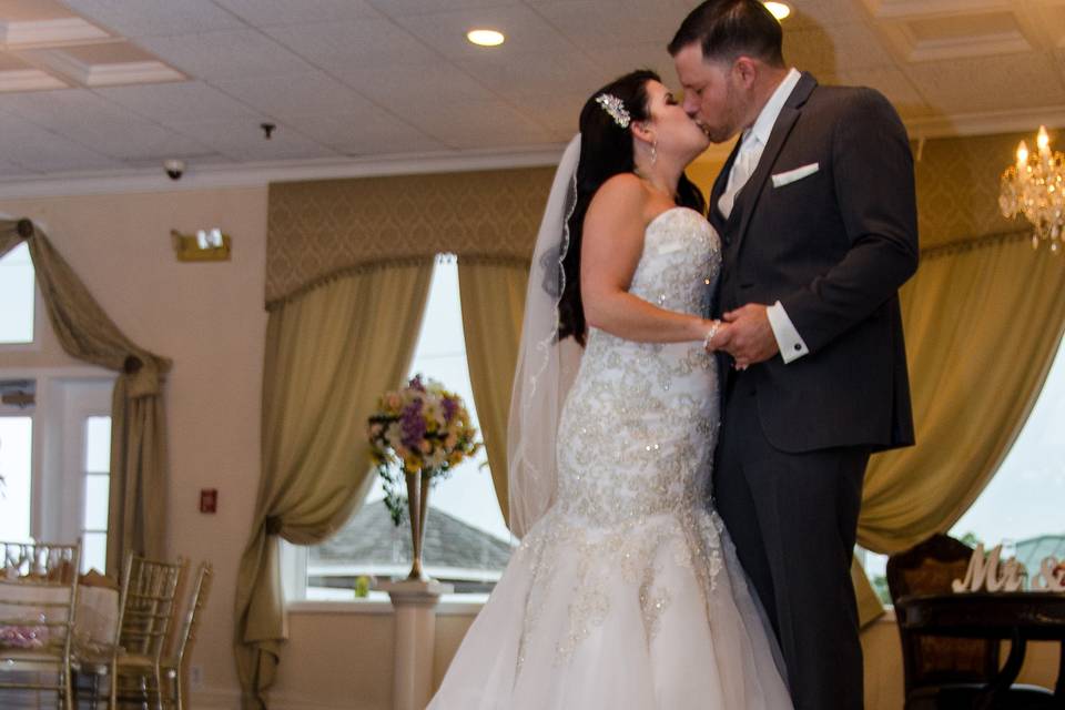 Newlyweds kissing