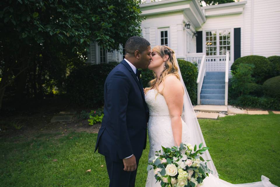 Husband and wife kissing