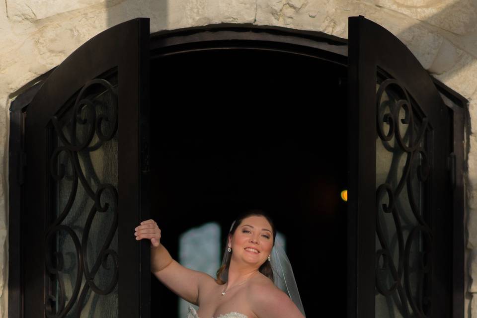 Bridal portrait with iron doors at The Springs in Katy, Texas