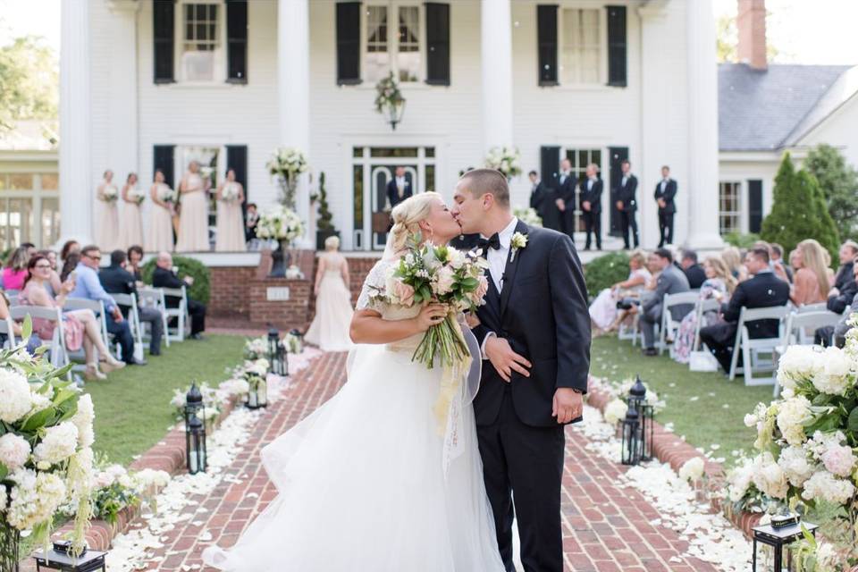 Newlyweds kissing