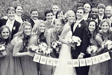 The couple with the bridesmaids and groomsmen