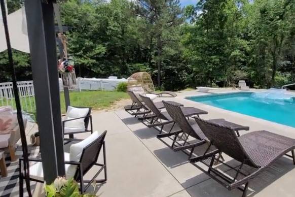 Swimming pool with lounge chairs