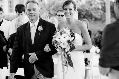 Bride and Father Walk down Isle