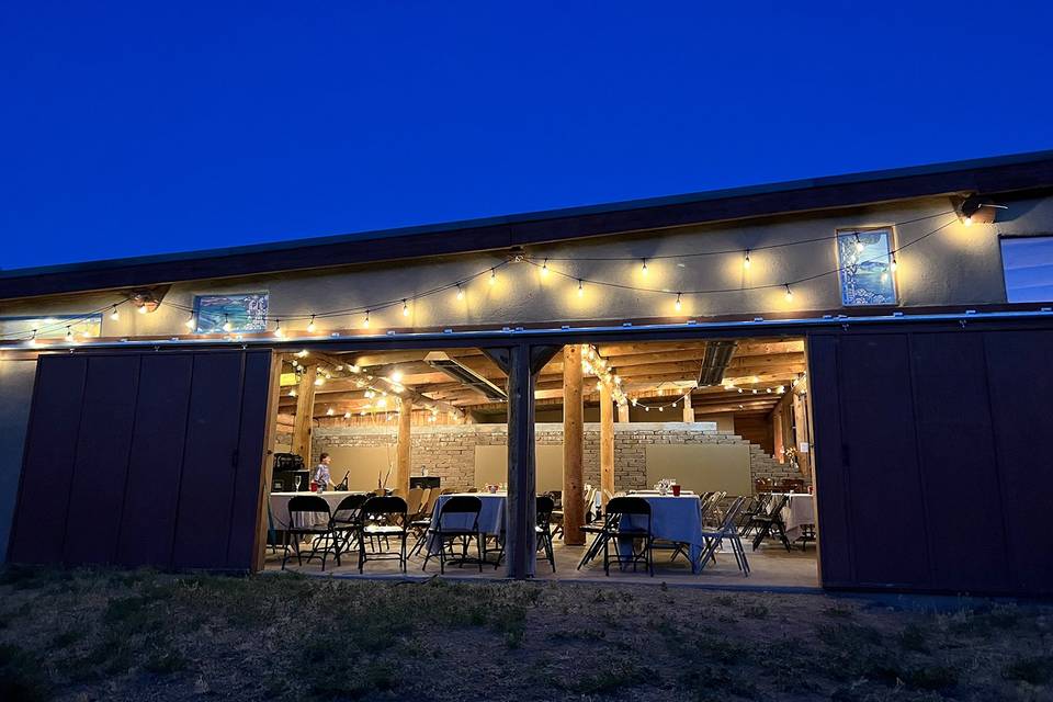 Barn doors open at night