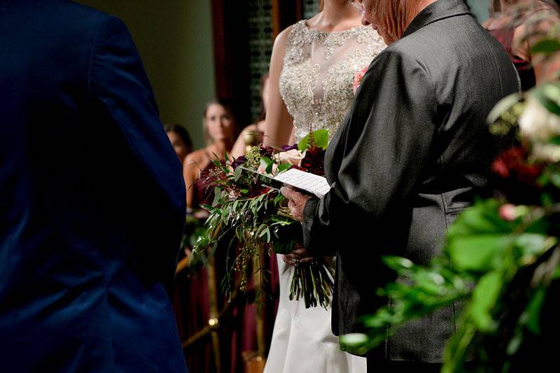 Exchanging vows | Photo by: Digital Galleria Designs