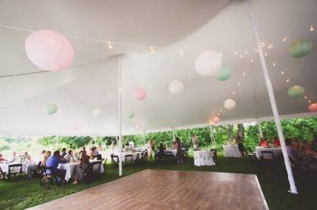 Wedding reception with Chinese lanterns and oak dance floor