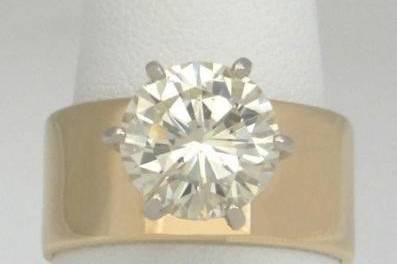 Gold ring with diamond center