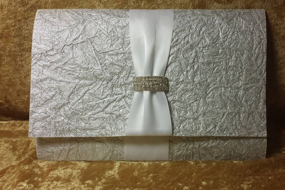 Grey pocketfold invitation with dior bow and buckle