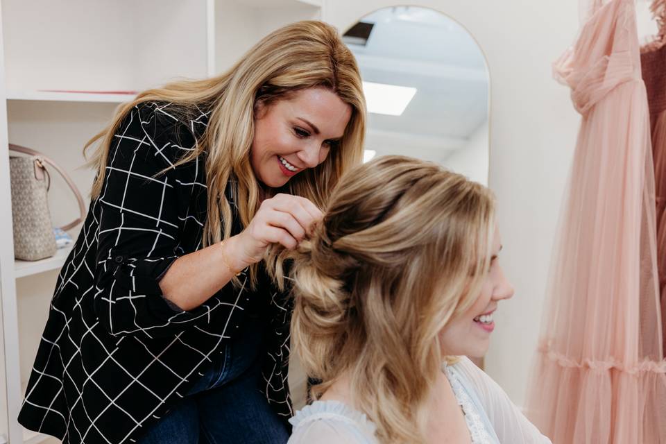 Nikki pinning an updo