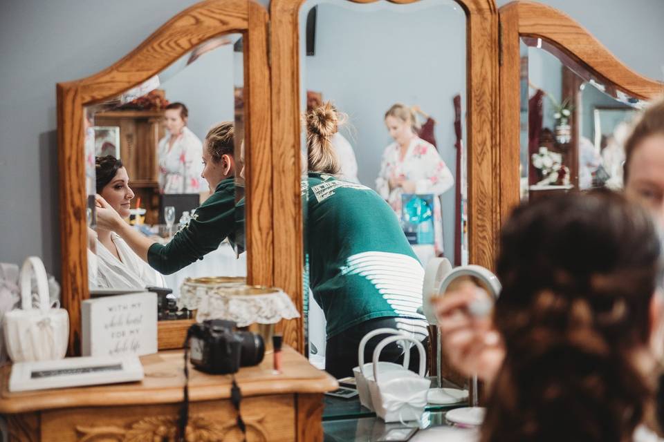 Bride getting makeup done