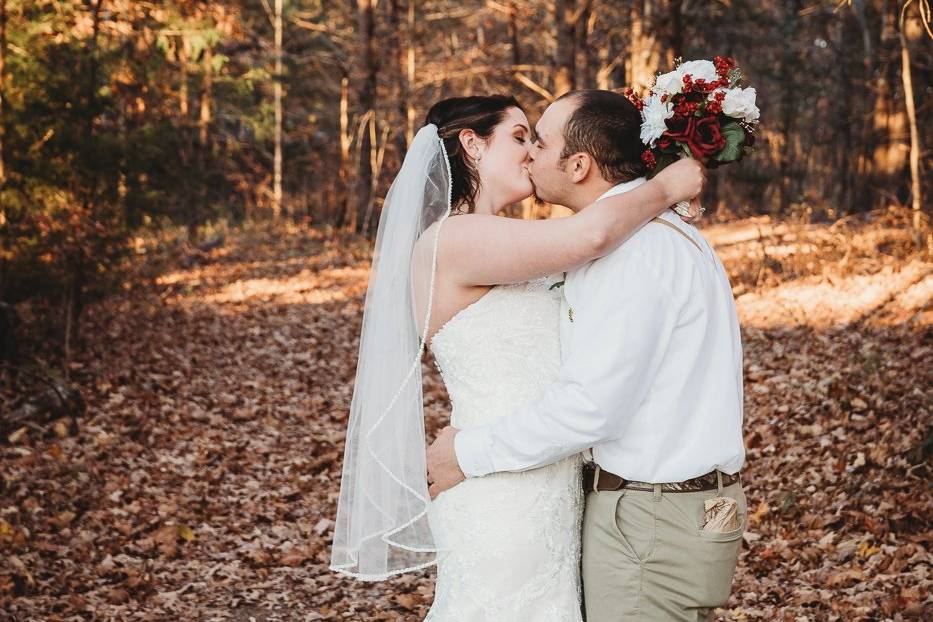 Couple sharing a kiss outdoors