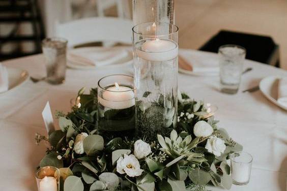 Candles and greenery wreath