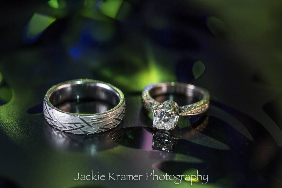 Wedding rings with a firey green glow