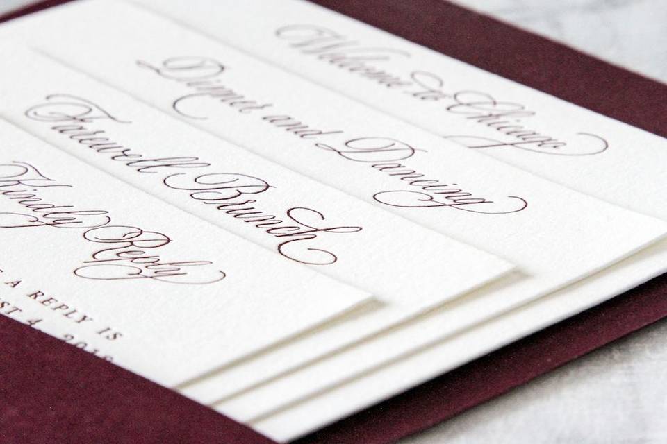 Letterpress printed cards in suite, using custom calligraphy.