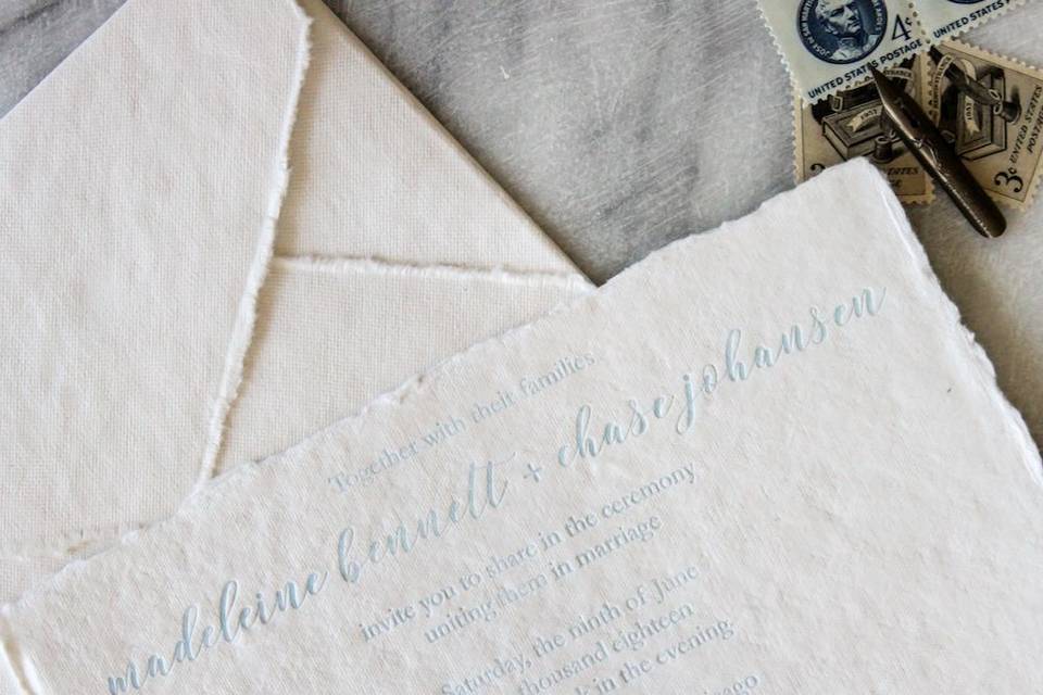 Letterpress wedding invitation on handmade cotton rag paper.